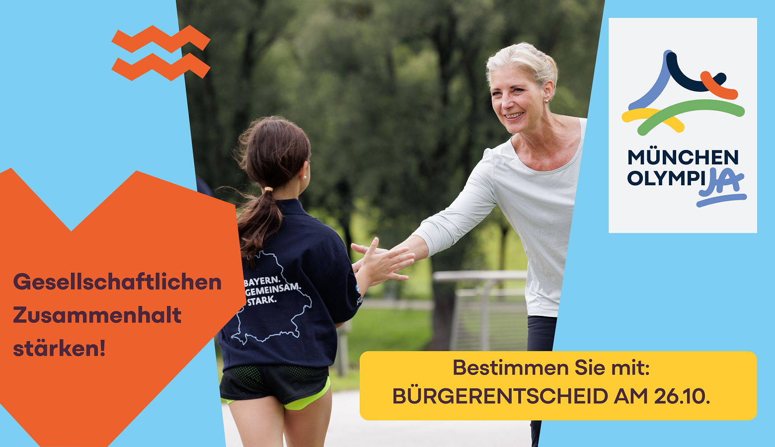 Frau StMin klatscht sich mit einer jungen Läuferin ab.